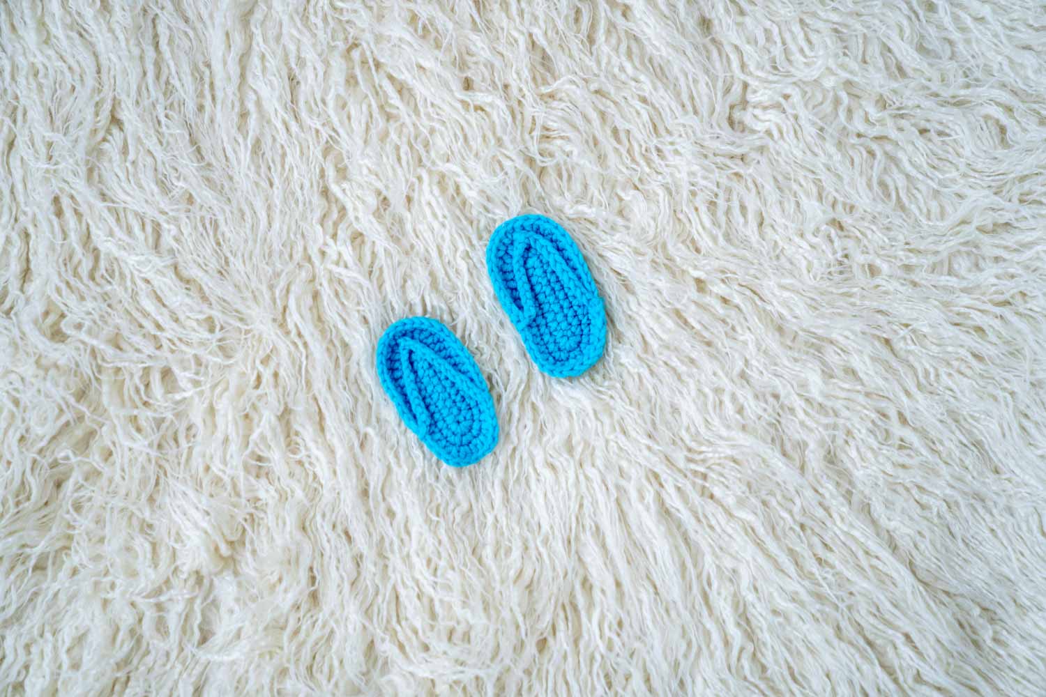 RENTAL- NEWBORN SLIPPERS